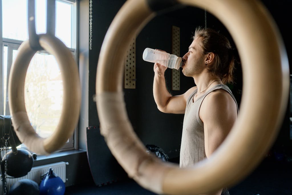 Man Drinking from Water Bottle